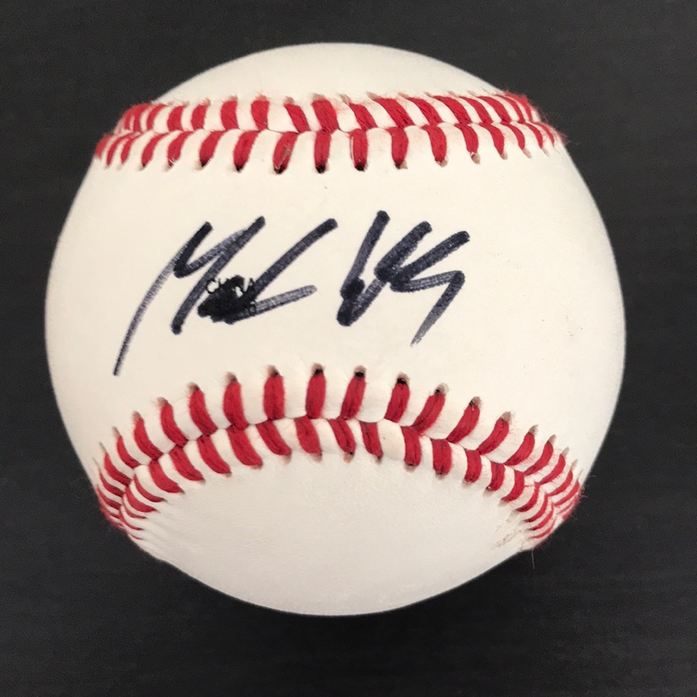 Signed baseball by professional player Mark Ellis